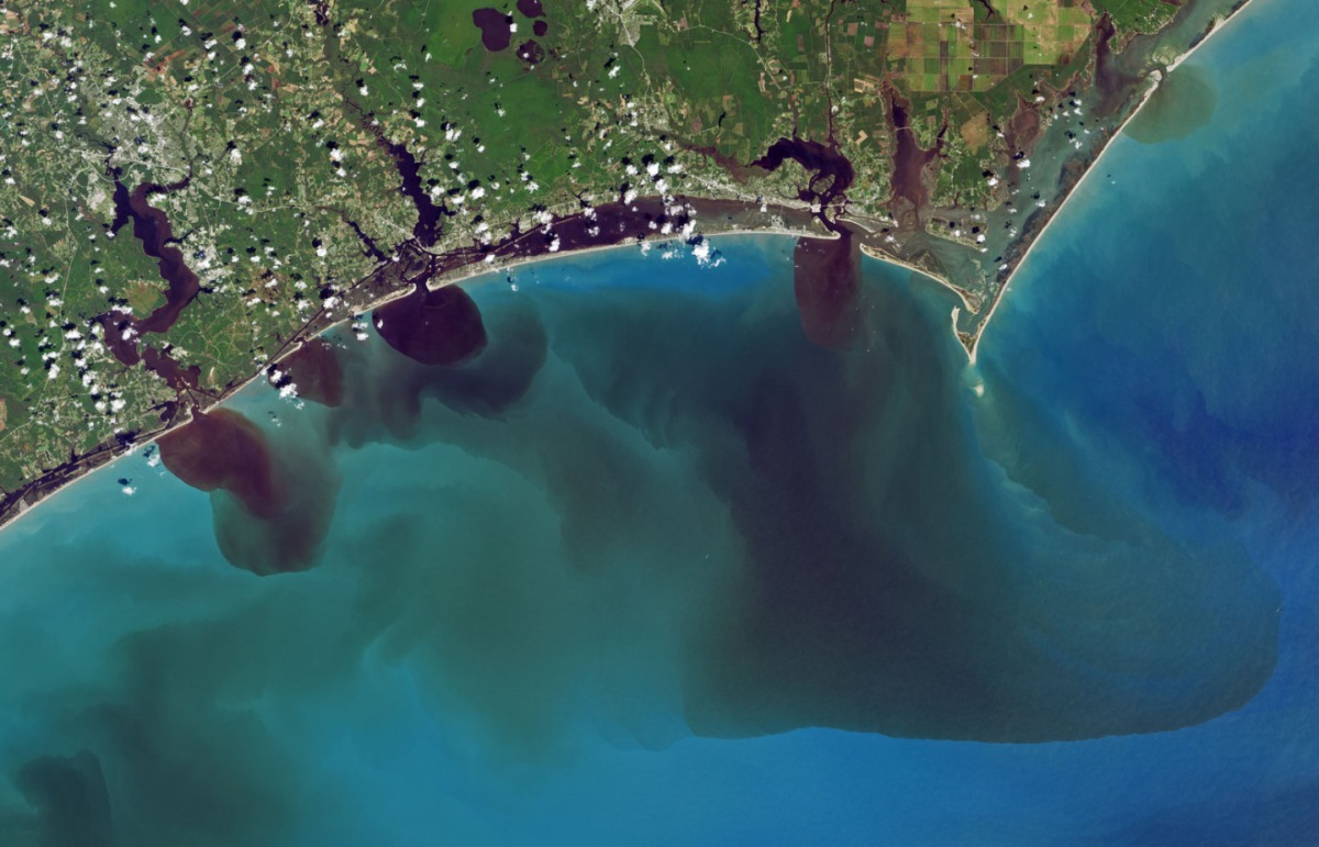 Inky Black, Polluted Rivers Seep into Ocean After Hurricane Florence in NASA Image